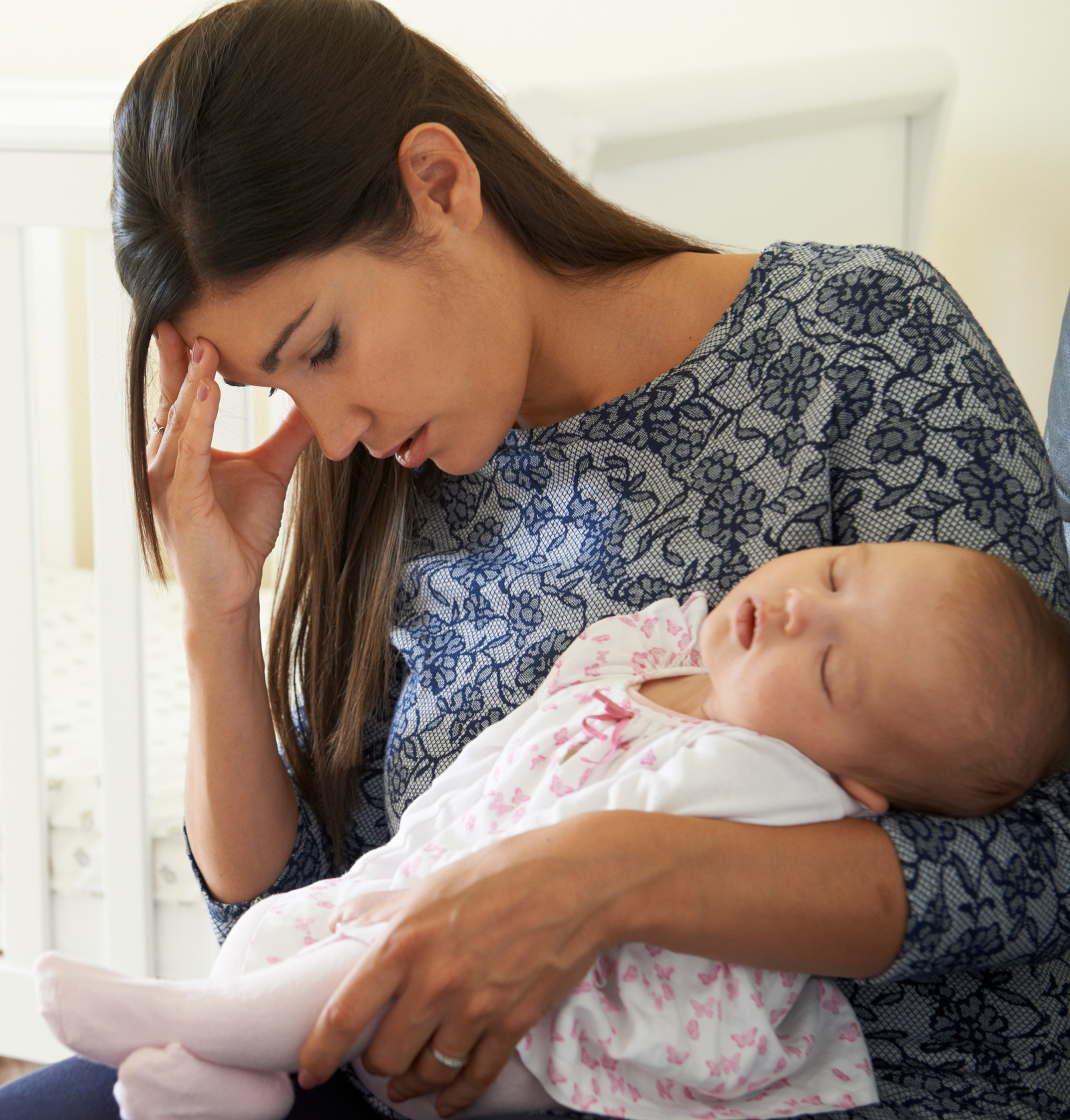 Tired Mother Suffering From Post Natal Depression