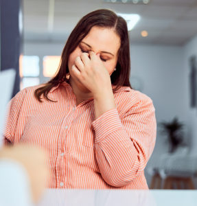 an-overweight-woman-looking-upset an-overweight-woman-looking-upset